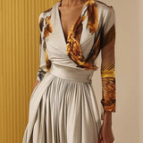 Stella | Tiefer V-Ausschnitt Weites Bein Jumpsuit
